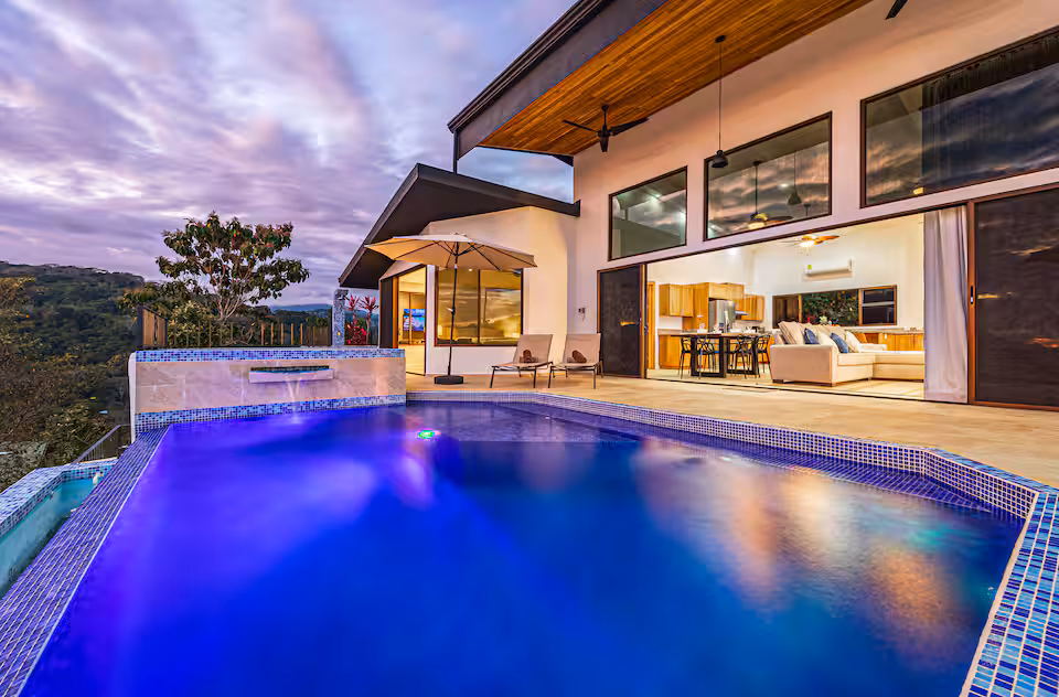 Spacious master bedroom with natural light at KsaLinda boutique villa