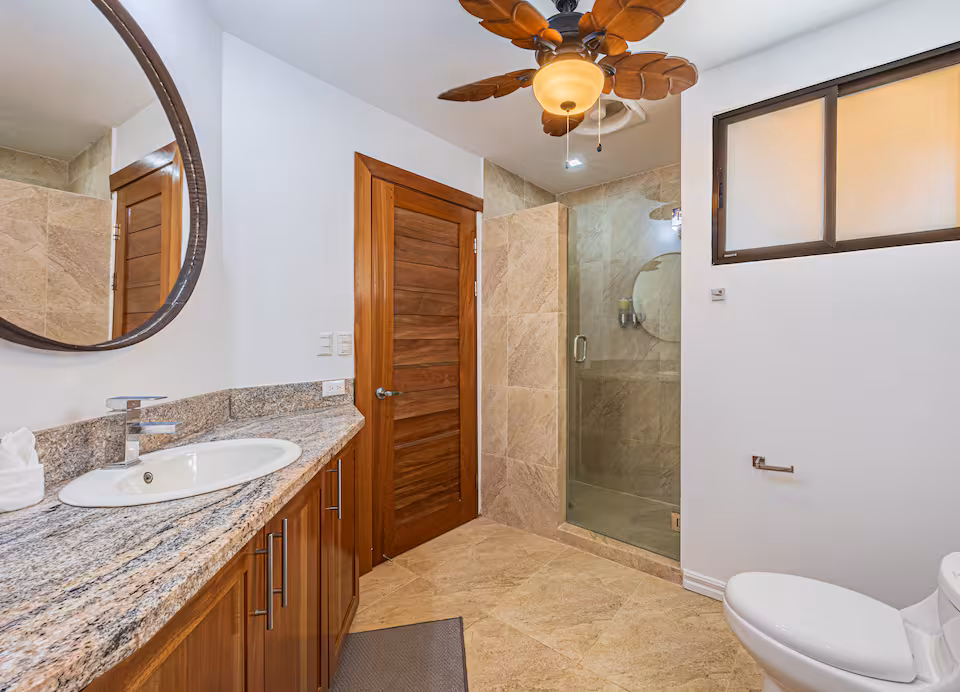 Relaxing by the infinity pool with ocean views at KsaLinda private pool villa